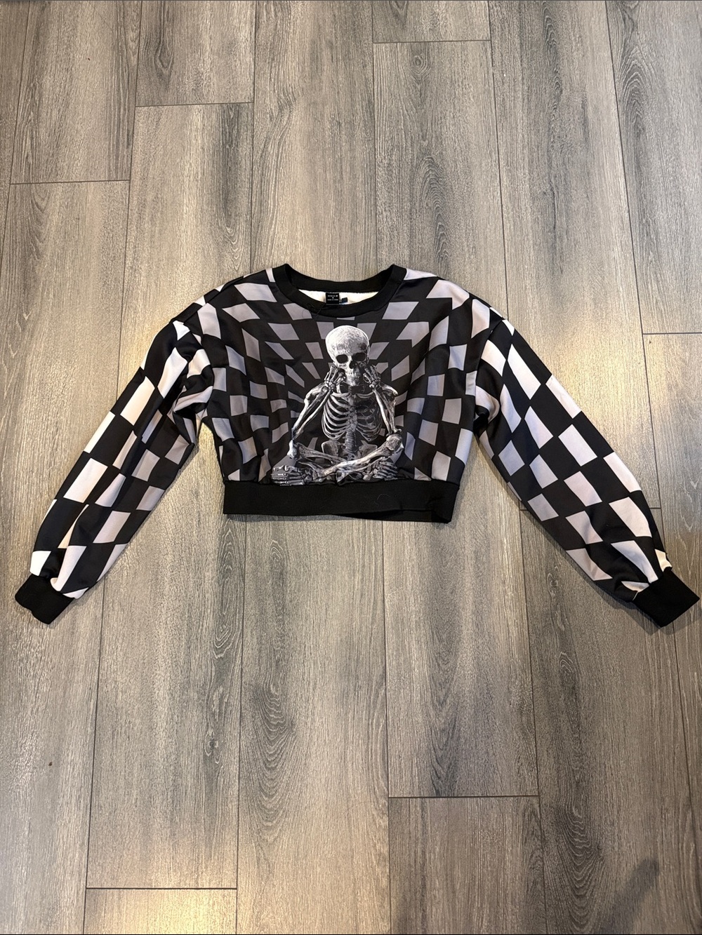 Black & White Checkerboard Cropped Sweater with Skeleton Graphic